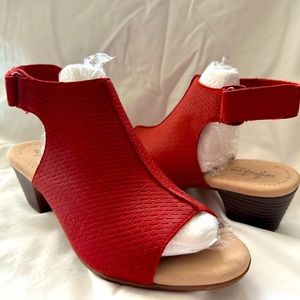 Women’s used Clark’s brand red open toe shoes size 8